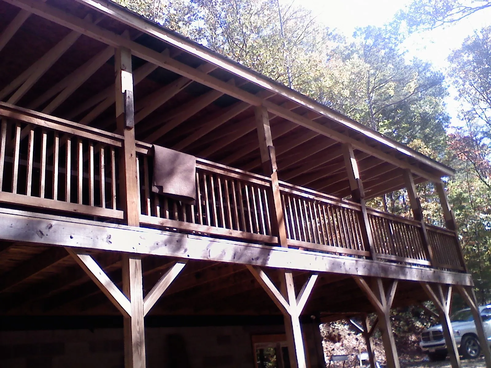 Timber framing under a new elevated porch and deck — Roof Leak Repair in Cedar Hill by Roofing Brothers